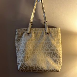Tan and gold Michael Kors tote bag